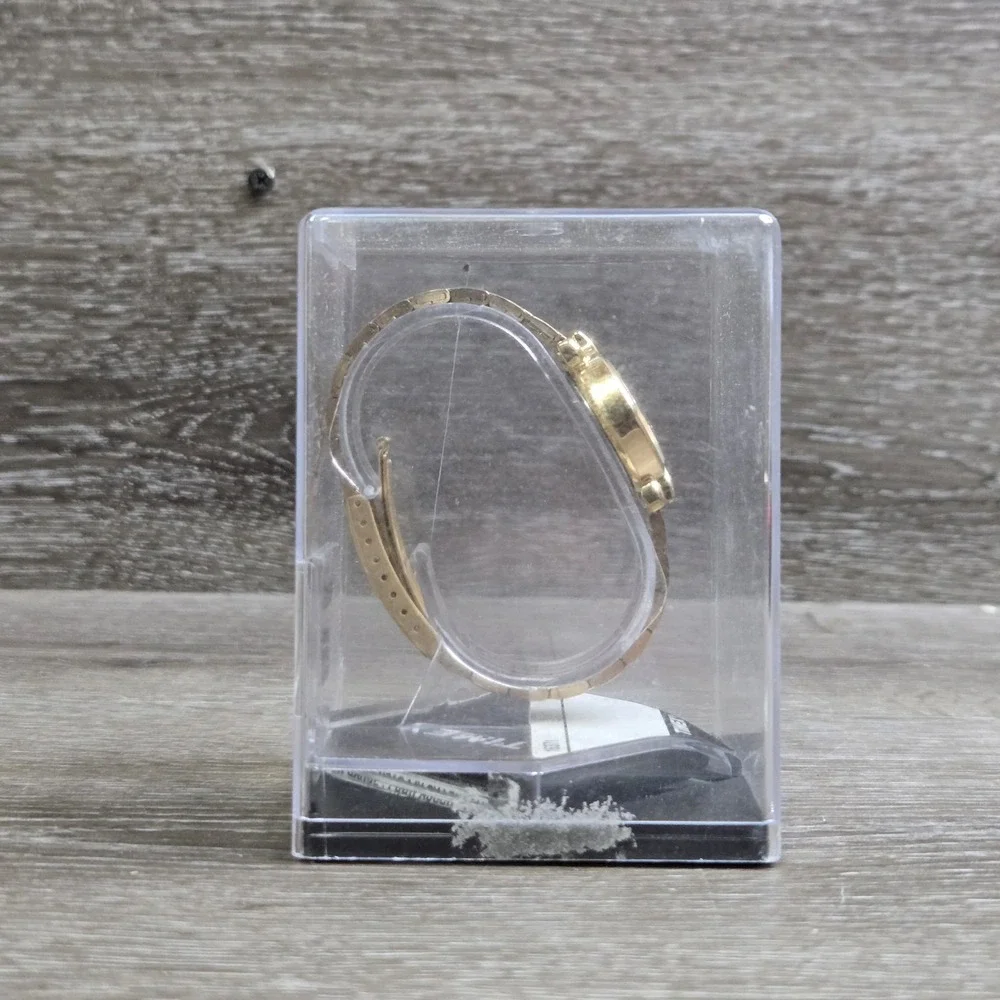 Vintage Timex Women's Gold tone Round Swirl Watch T119 White Dial 30M Old Stock